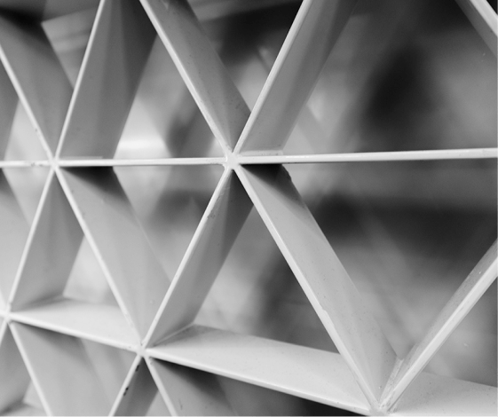 a white metal grid with a diamond pattern